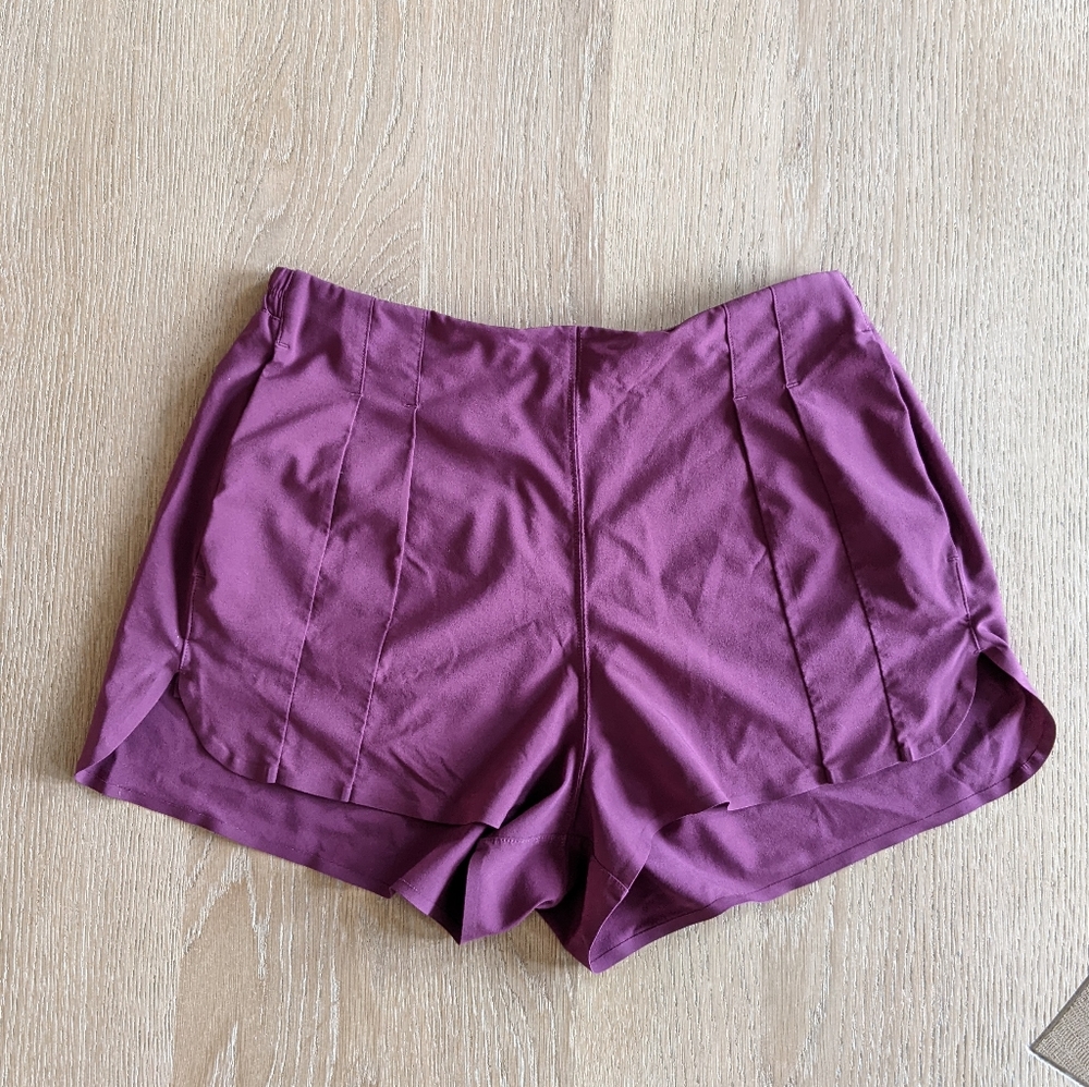 lululemon • magenta running shorts
